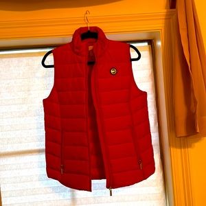 Brand new, never worn winter red Michael lord vest in small. Excellent condition